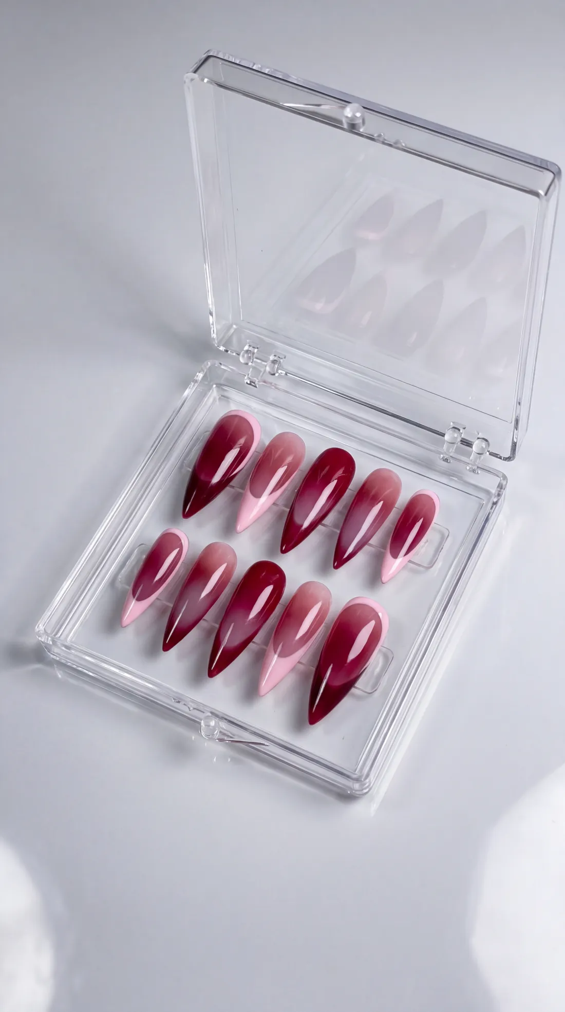 Pretty Girl press-on nails in their case