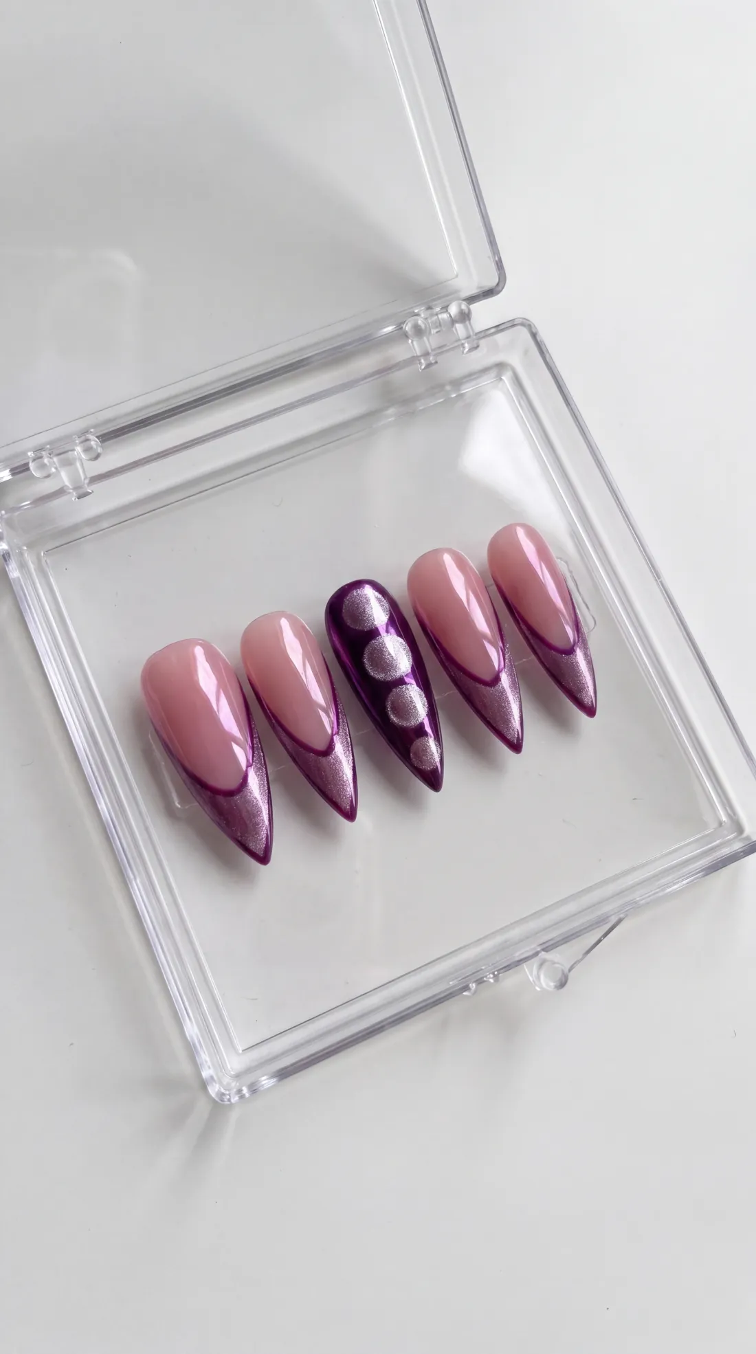 Signed and Set press-on nails in their case